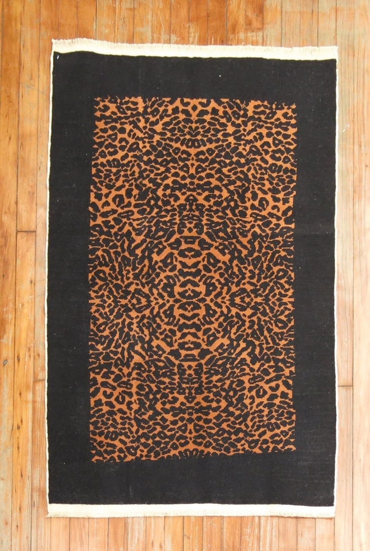 2' 11" x 4' 6" Anatolian pictorial leopard motif rug: 2' 11" x 4' 6" Anatolian pictorial leopard motif rug Vintage Turkish rug with an allover leopard motif. This 20th-century pictorial Anatolian piece is a small pre-owned rug and appears to date to the 