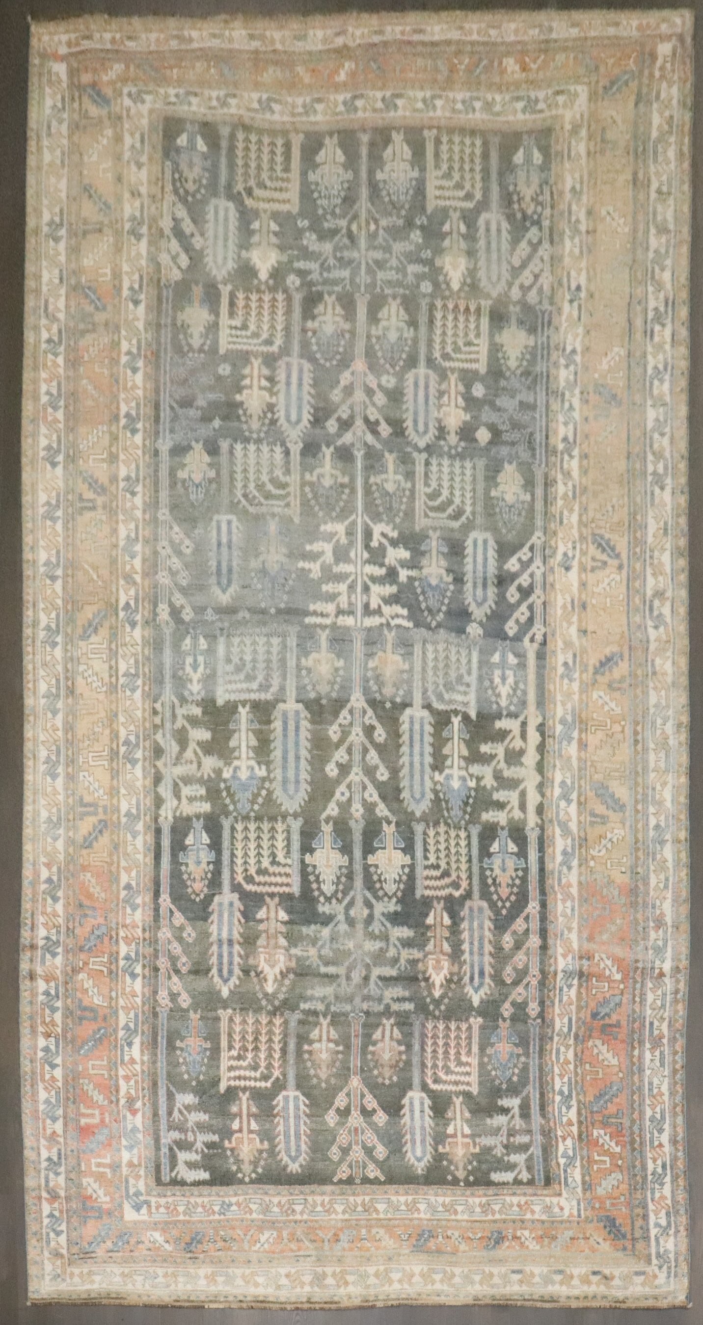 6' 11" x 12' 7" Early 20th Century Kurd Bakhtiari Gallery Rug: 6' 11" x 12' 7" Early 20th Century Kurd Bakhtiari Gallery Rug Early 20th-century Kurd Bakhtiari gallery rug with a willow tree design. This pre-owned piece is identified as Bakhtiari and Kurd, and is 