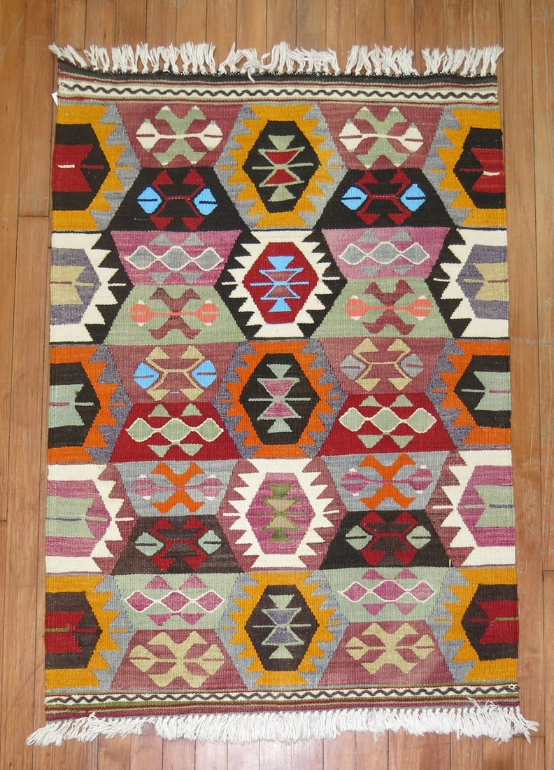 2' 10" x 3' 9" Turkish Yastik Kilim Rug 20th Century: 2' 10" x 3' 9" Turkish Yastik Kilim Rug 20th Century Vintage Turkish kilim from the third quarter of the 20th century. This pre-owned small yastik rug features the classic flat-woven kilim form and of