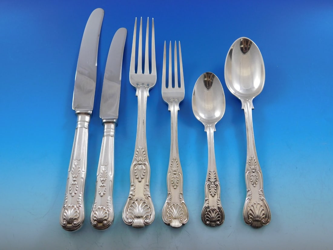 82 Piece Kings Pattern Sterling Silver Flatware Set with Chest: 82 Piece Kings Pattern Sterling Silver Flatware Set with Chest This early assembled English flatware set features the classic Kings and Queens shell motif and consists of 82 pieces made primarily of s