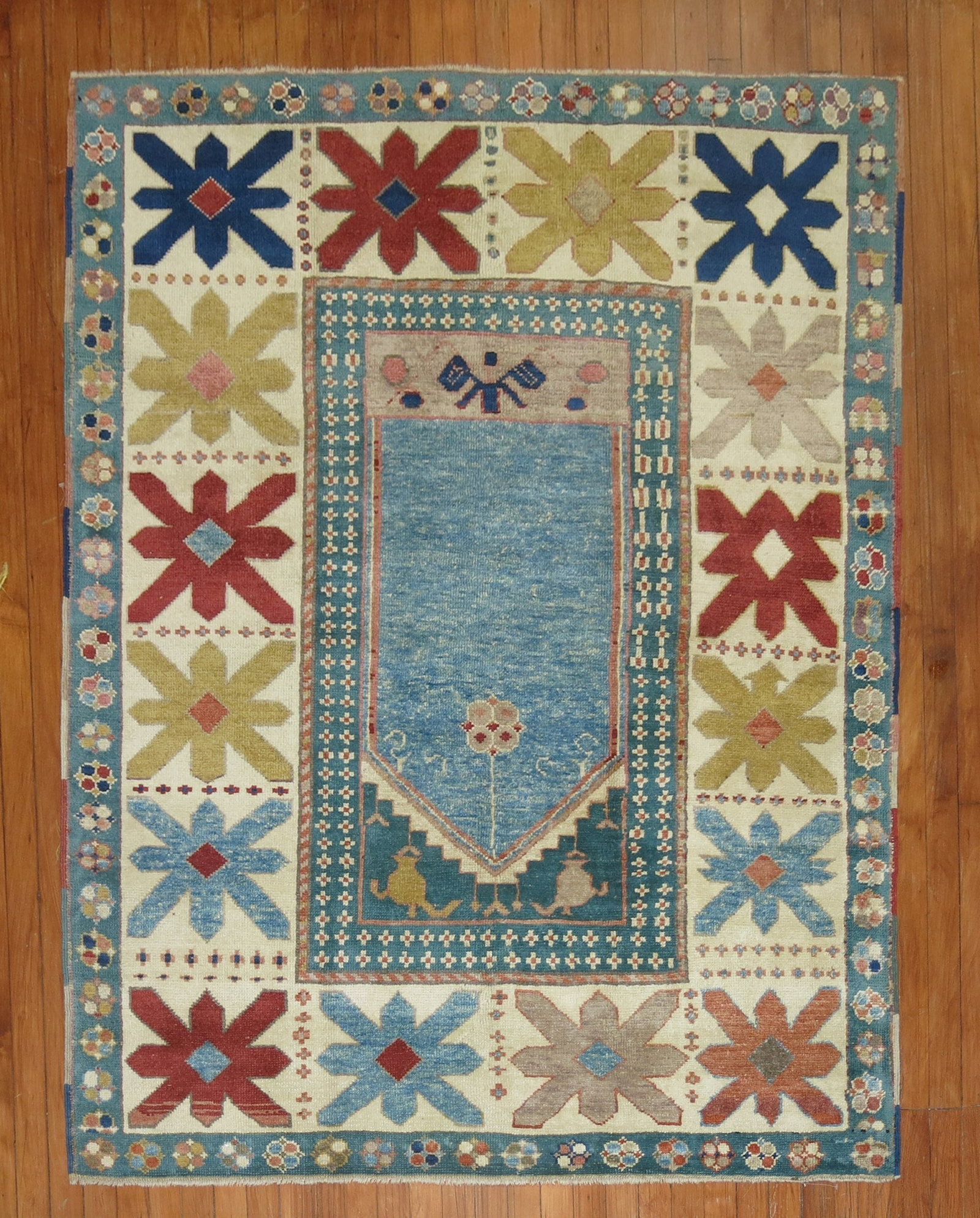 4' 9" x 6' 1" Vintage Konya Prayer Rug Repro: 4' 9" x 6' 1" Vintage Konya Prayer Rug Repro One-of-a-kind vintage Turkish prayer rug featuring a prayer niche motif. This pre-owned rug is identified as a Konya reproduction and works well as an acce
