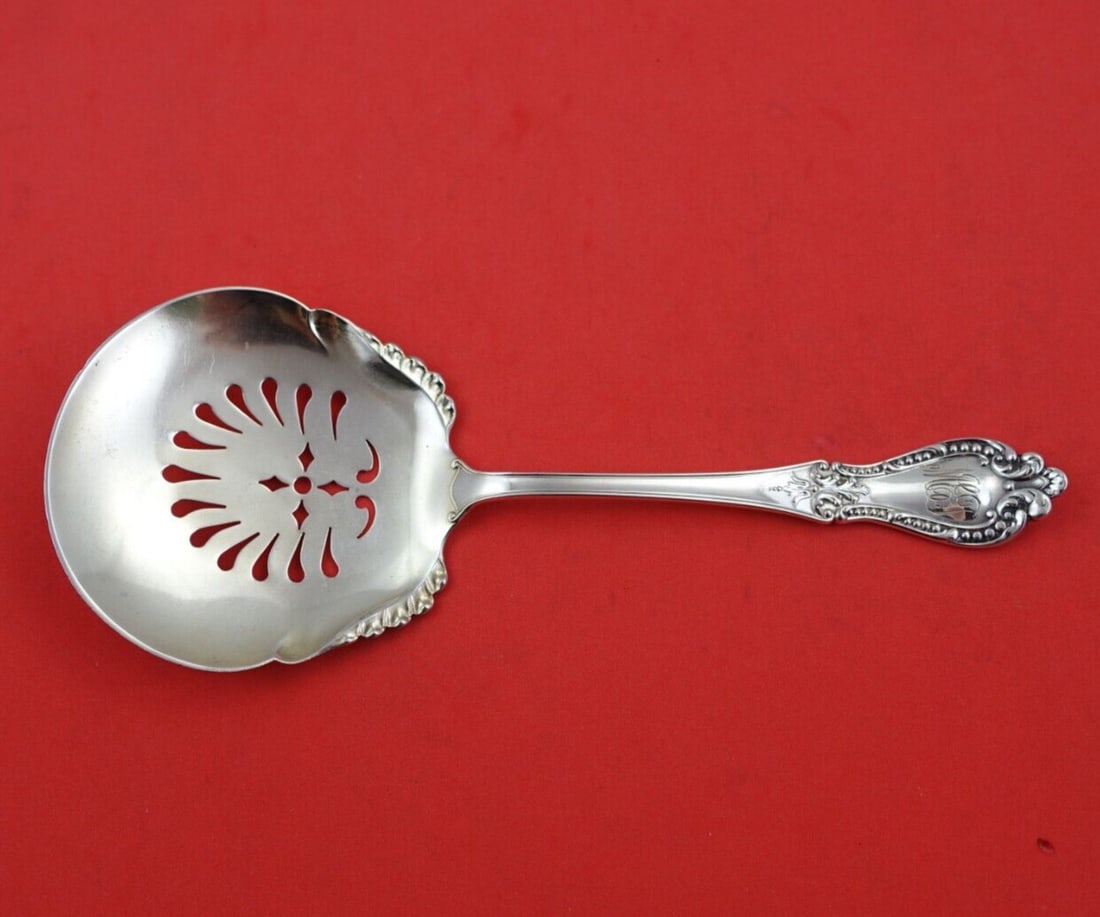 Watson Jefferson Sterling Silver Pierced Tomato Server 7 5/8": Watson Jefferson Sterling Silver Pierced Tomato Server 7 5/8" Experience the elegance of the Jefferson pattern with this exquisite sterling silver tomato server by Watson. Crafted from all sterling si