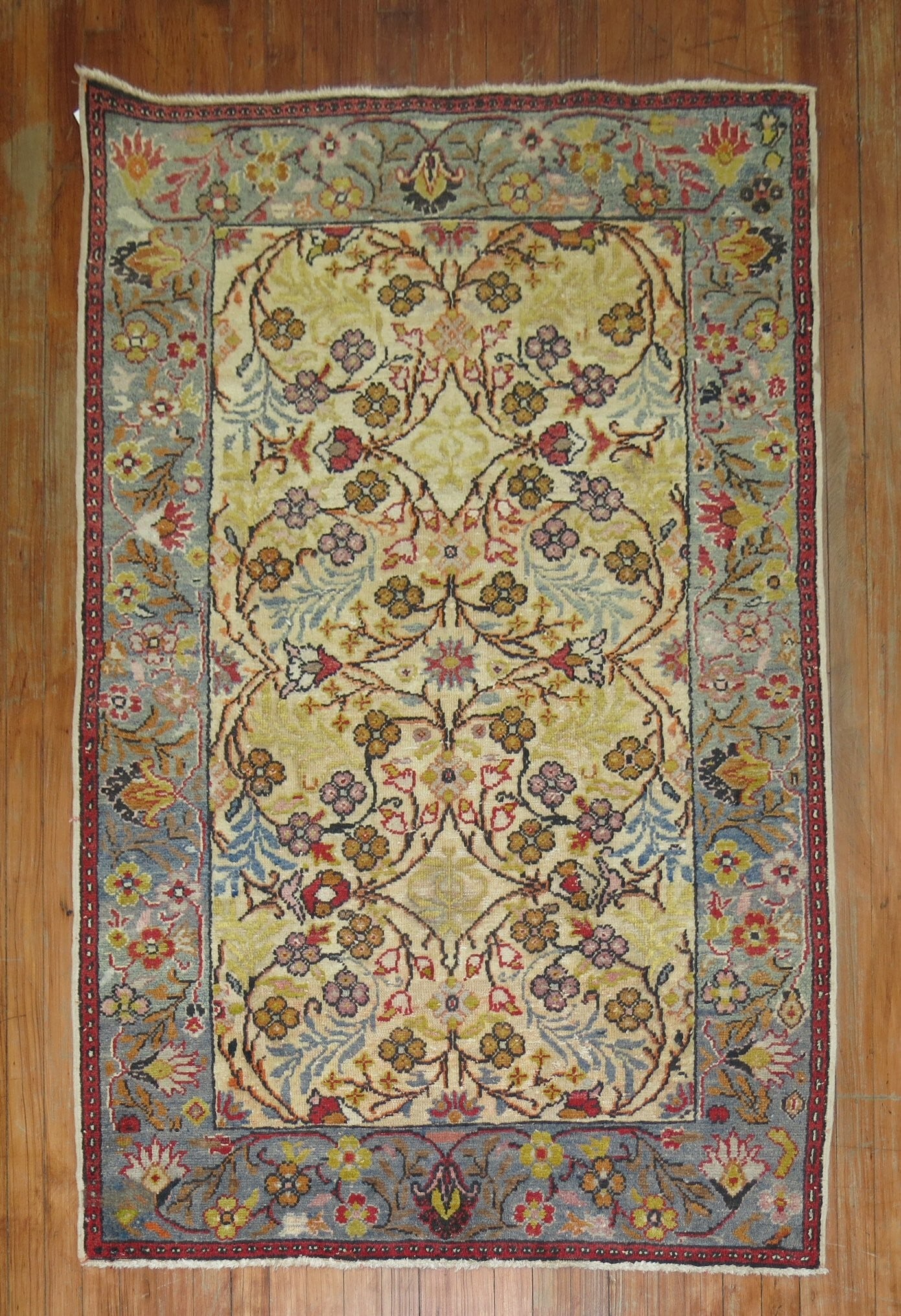 3' 9" x 5' 6" Mid 20th Century Turkish Floral Rug: 3' 9" x 5' 6" Mid 20th Century Turkish Floral Rug Vintage Turkish floral rug from the mid-20th century with a floral design. This pre-owned small rug offers classic Turkish style and character. Specif