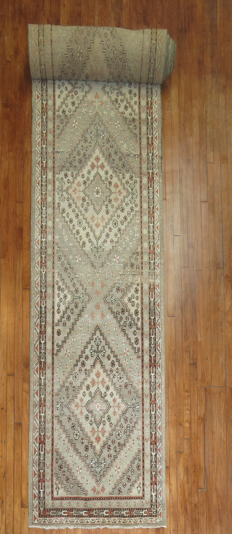 3' 7" x 33' 5" Khotan runner from East Turkestan: 3' 7" x 33' 5" Khotan runner from East Turkestan Antique East Turkestan Khotan runner from the early 20th century. This pre-owned rug is identified as a Khotan runner. Specifications Type: Khotan Cate