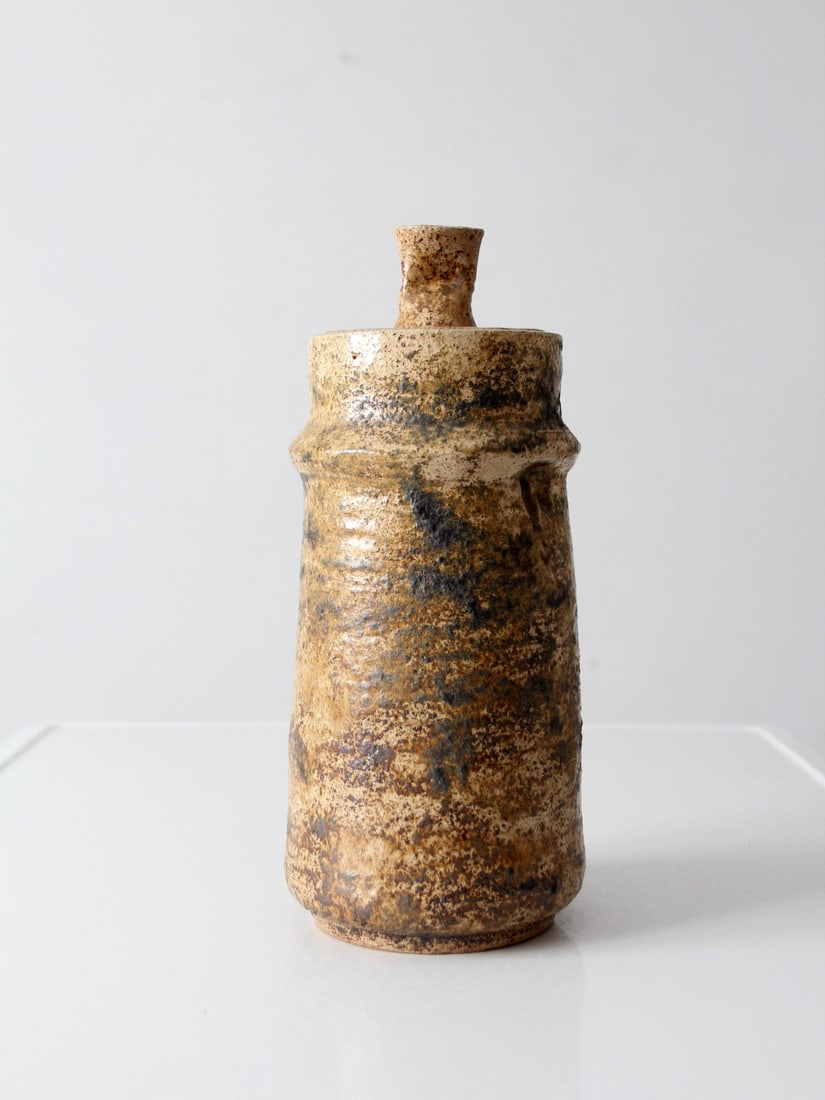Signed 1970s Studio Pottery Jar with Lid 13.5 inch: Signed 1970s Studio Pottery Jar with Lid 13.5 inch Vintage 1970s handmade studio pottery jar with a tall cylindrical form and sculptural lid. It features a richly mottled earth-tone glaze layered with