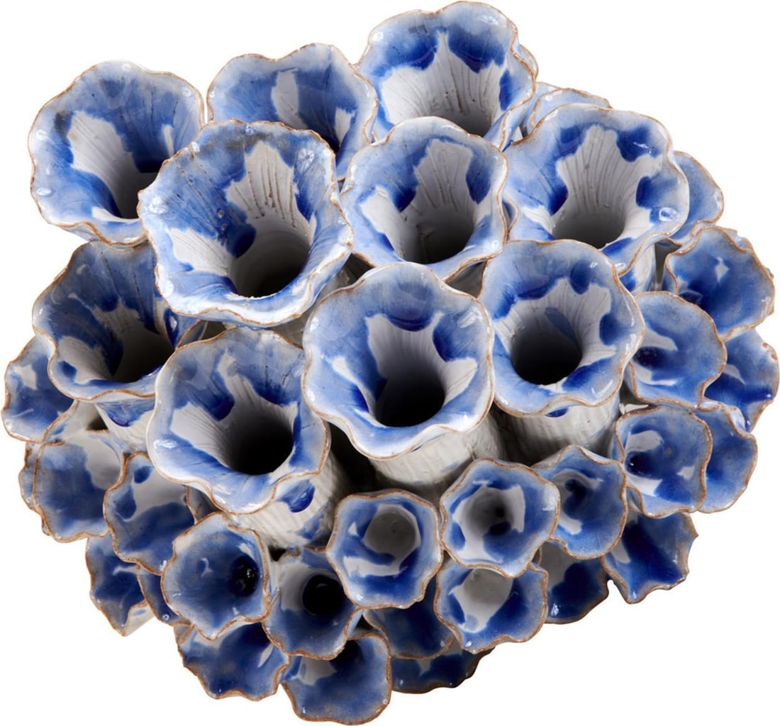 Blue White Sea Coral Ceramic Vase 8.5H: Blue White Sea Coral Ceramic Vase 8.5H Add a touch of coastal charm to your home with this exquisite sea coral ceramic vase. This beautifully designed vase features a striking blue and white finish, p