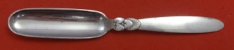 Georg Jensen Cactus Sterling Silver Cheese Scoop 6 7/8" GJ Mark: Georg Jensen Cactus Sterling Silver Cheese Scoop 6 7/8" GJ Mark Experience the elegance of the Cactus pattern by Georg Jensen with this exquisite sterling silver cheese scoop. Measuring 6 7/8 inches, 