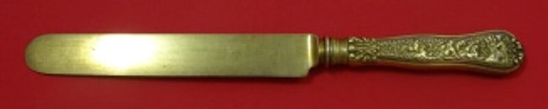 Tiffany & Co Olympian Sterling Silver Vermeil Knife 9 1/4": Tiffany & Co Olympian Sterling Silver Vermeil Knife 9 1/4" This exquisite knife from the Olympian pattern by Tiffany & Co. features a stunning sterling silver hollow handle and a blunt blade that is v