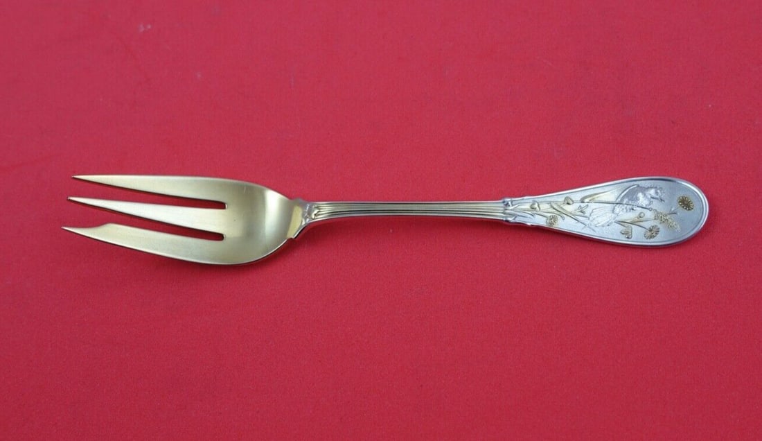 Tiffany & Co Japanese Sterling Silver Oyster Fork 3-Tine Gold Wash 5": Tiffany & Co Japanese Sterling Silver Oyster Fork 3-Tine Gold Wash 5" This exquisite oyster fork by Tiffany & Co. showcases the elegance of the Japanese pattern, featuring a 3-tine design with gold wa