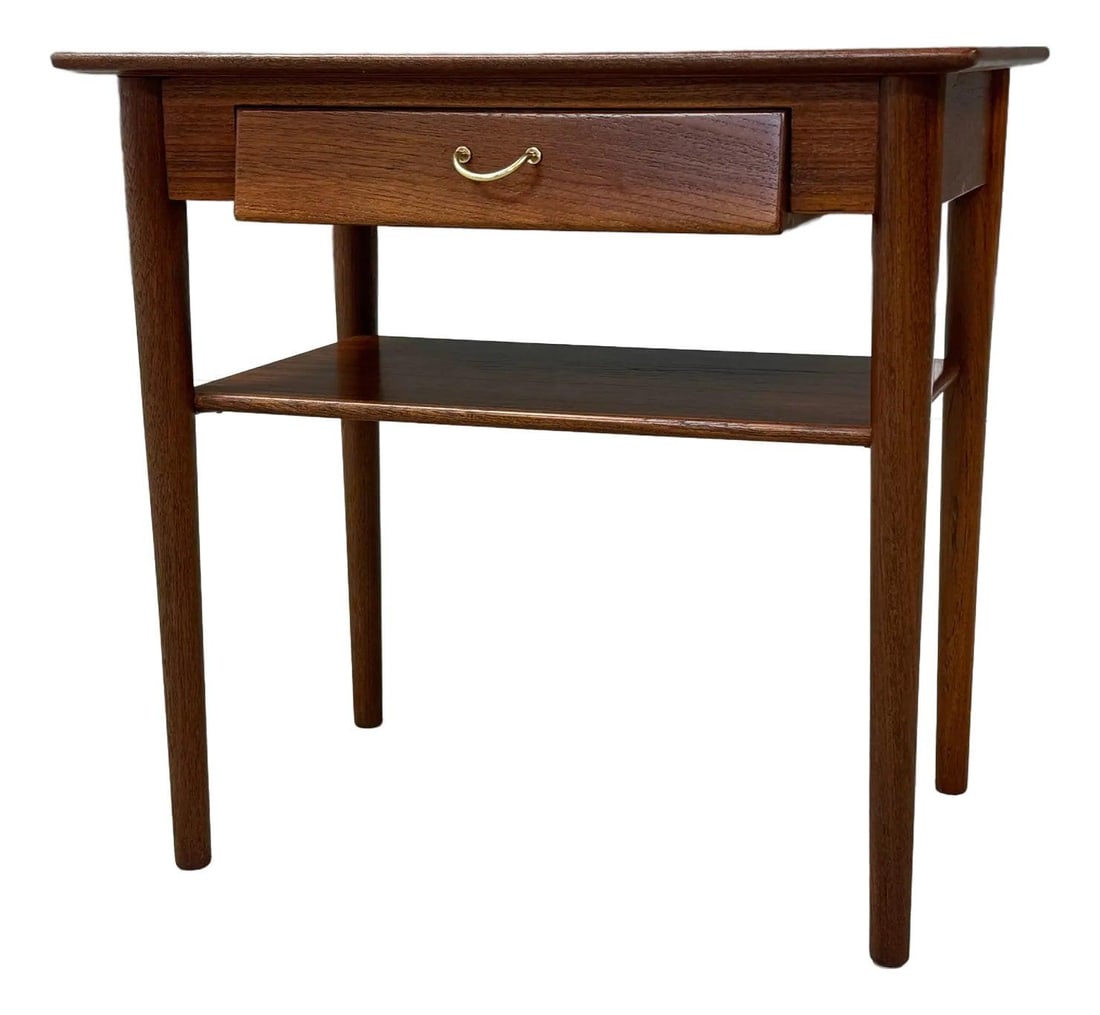 1960s Danish Modern Teak Nightstand with Brass Pull: 1960s Danish Modern Teak Nightstand with Brass Pull Discover this beautifully refinished mid-century modern teak nightstand, featuring a single hand-cut dovetail drawer and an elegant brass drawer pul