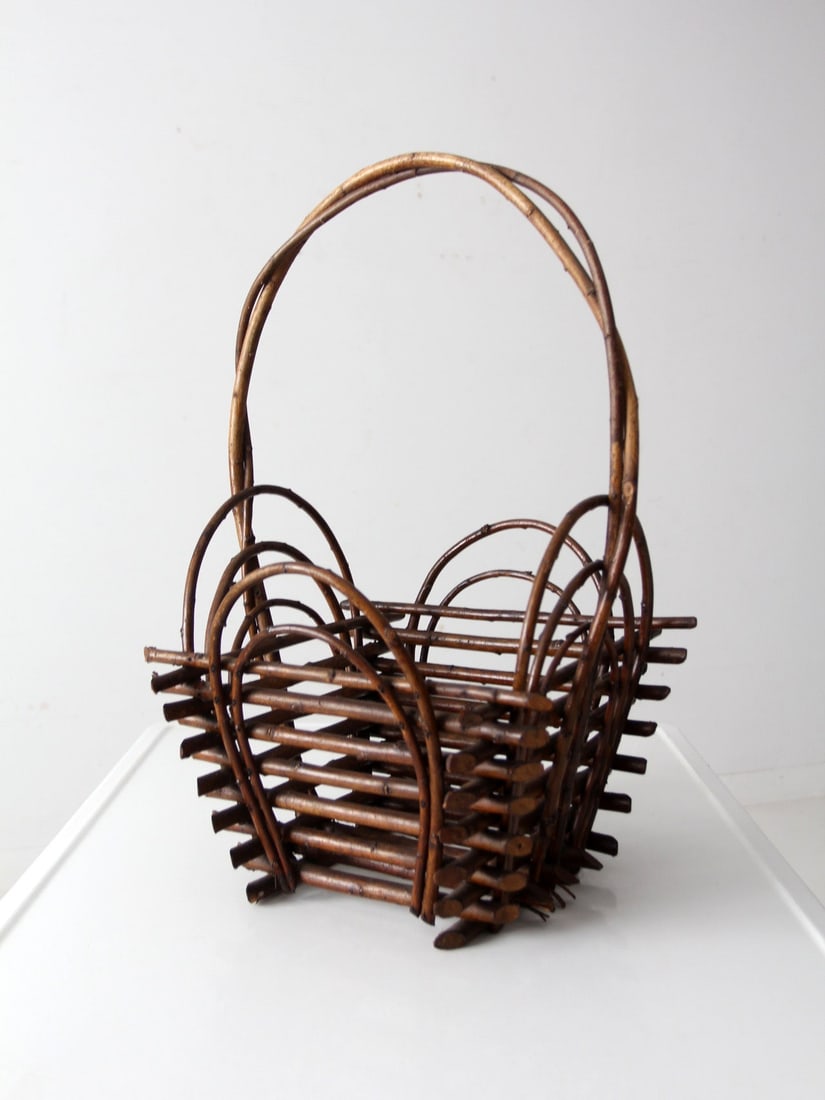 Handcrafted Vintage Twig Basket Rustic Accent 14.5 x 13.75 x 22.5: Handcrafted Vintage Twig Basket Rustic Accent 14.5 x 13.75 x 22.5 This charming vintage twig basket is handcrafted from rustic natural wood branches and features a twisted handle, making it a perfect 