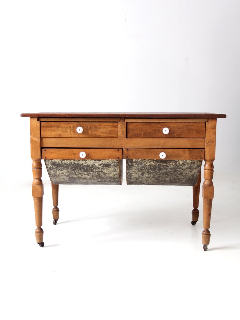 Circa 1900 Antique Baker's Doughboy Table with Drawers: Circa 1900 Antique Baker's Doughboy Table with Drawers This antique baker's "doughboy" table, dating back to circa 1900, showcases two galvanized flour bin drawers and two slender top drawers. It feat