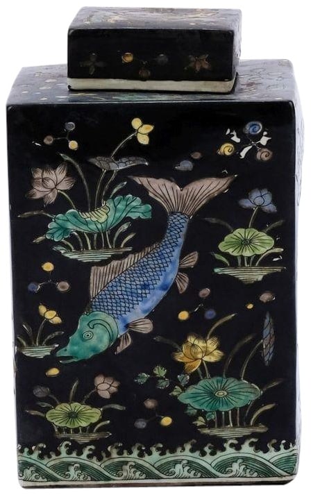 Handmade Black Porcelain Tea Jar with Fish Design 12H 7W 7D: Handmade Black Porcelain Tea Jar with Fish Design 12H 7W 7D This exquisite black porcelain tea jar features an artistic fish design, embodying the elegance of Asian antique style. Handcrafted with car