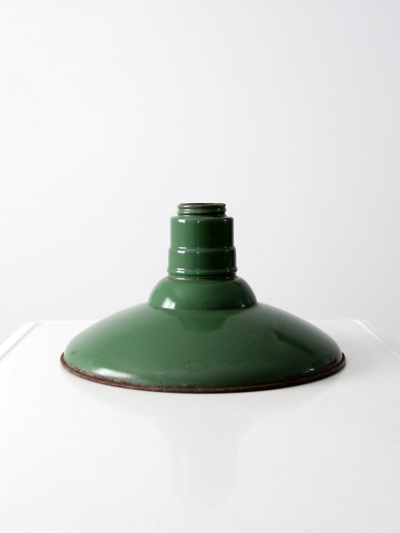 Green Porcelain Enamel Industrial Pendant Light Shade 16 inch: Green Porcelain Enamel Industrial Pendant Light Shade 16 inch Vintage industrial pendant light shade with a green porcelain enamel exterior, white enamel interior, and a wide spun steel form. This pre