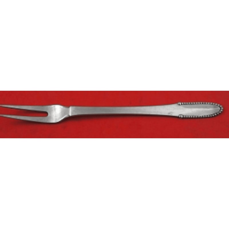 Georg Jensen Beaded Sterling Silver Serving Fork 7 1/4 inch: Georg Jensen Beaded Sterling Silver Serving Fork 7 1/4 inch This exquisite serving fork from Georg Jensen showcases the elegant Beaded pattern, crafted from high-quality sterling silver. Measuring 7 1