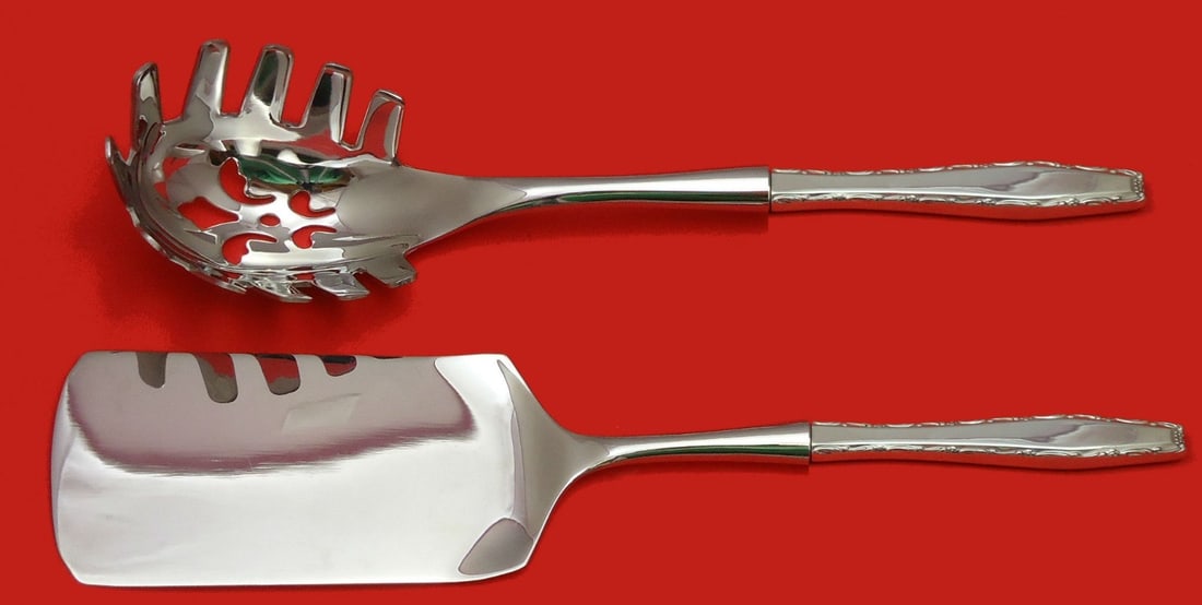 Lunt Rapallo Sterling Silver 2pc Italian Pasta Server Set: Lunt Rapallo Sterling Silver 2pc Italian Pasta Server Set This exquisite 2-piece Italian Pasta Server Set from Lunt features custom-made hollow handles crafted from sterling silver, combined with dura