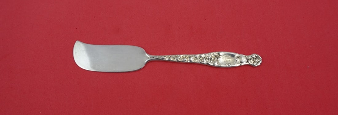 Whiting Heraldic Sterling Silver Butter Spreader 5 5/8 Inch: Whiting Heraldic Sterling Silver Butter Spreader 5 5/8 Inch This exquisite butter spreader features a flat handle and is crafted from high-quality sterling silver, showcasing the elegant Heraldic patt