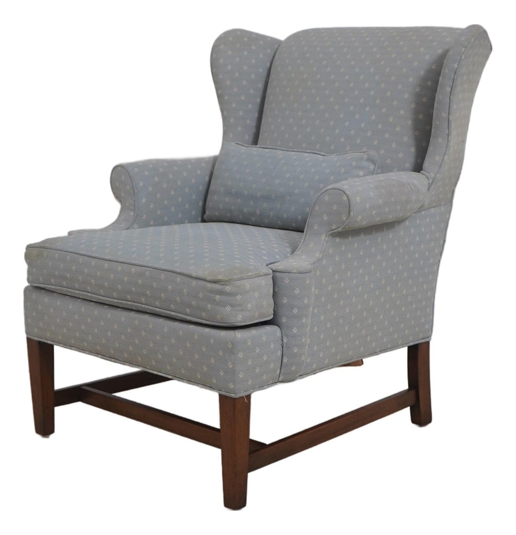 Mahogany Chippendale Style Wingback Chair with Stretcher Base: Mahogany Chippendale Style Wingback Chair with Stretcher Base This Drexel Chippendale wing back lounge chair features a classic 18th-century inspired design with high-quality mahogany construction. Th