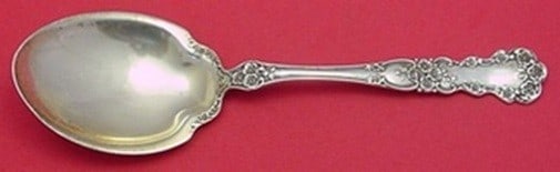 Sterling Silver 9 Inch Berry Spoon in Buttercup Pattern by Gorham: Sterling Silver 9 Inch Berry Spoon in Buttercup Pattern by Gorham This vintage Buttercup pattern berry spoon by Gorham is crafted from sterling silver and measures 9 inches in length. The serving spoo
