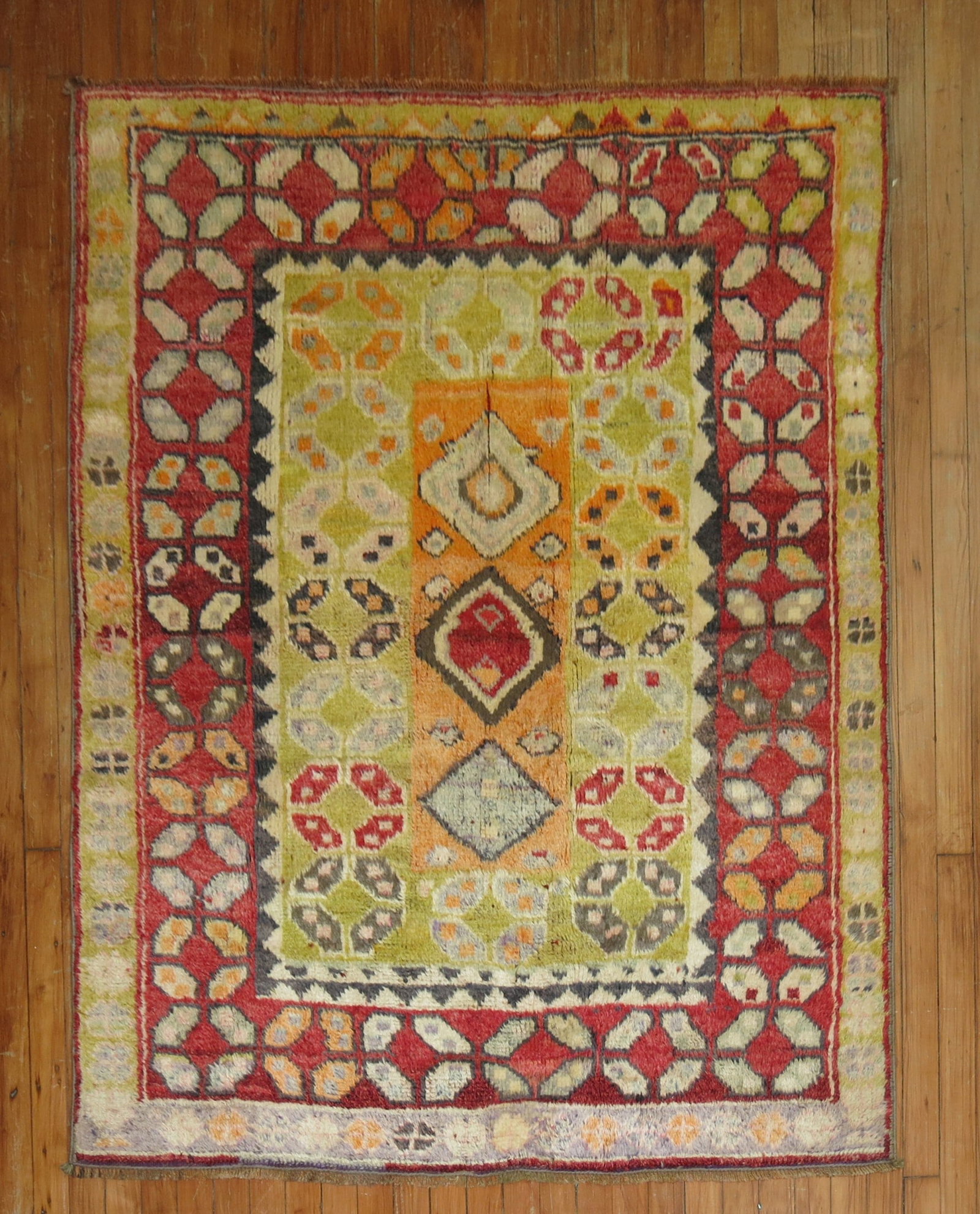 4' 3" x 5' 6" Turkish Tulu Accent Rug: 4' 3" x 5' 6" Turkish Tulu Accent Rug Bright Turkish Tulu rug from the mid 20th century. This pre-owned accent rug features the Tulu type and offers a distinctive decorative presence. Specifications O