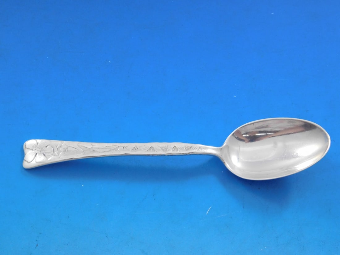 Tiffany Sterling Silver Teaspoon Lap Over Edge Flax Flower 6" Monogrammed: Tiffany Sterling Silver Teaspoon Lap Over Edge Flax Flower 6" Monogrammed This exquisite teaspoon from Tiffany & Co. showcases the elegant Lap Over Edge pattern, featuring a beautifully acid-etched fl