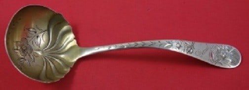 Towle Number 43 Sterling Silver Gravy Ladle Goldwashed 7 1/8": Towle Number 43 Sterling Silver Gravy Ladle Goldwashed 7 1/8" Towle Number 43 sterling silver gravy ladle with a goldwashed bright-cut finish. It measures 7 1/8 inches and is monogrammed, with monos v