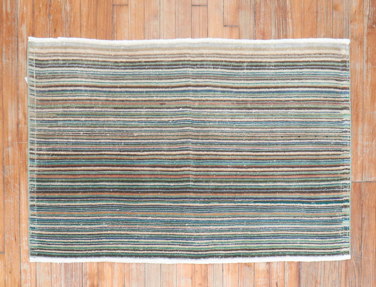 2' 5" x 3' 11" Turkish Deco rug with thin striped design: 2' 5" x 3' 11" Turkish Deco rug with thin striped design Mid-20th century Turkish Deco rug featuring a thin striped design. This pre-owned small rug offers a classic decorative look with Turkish Deco 