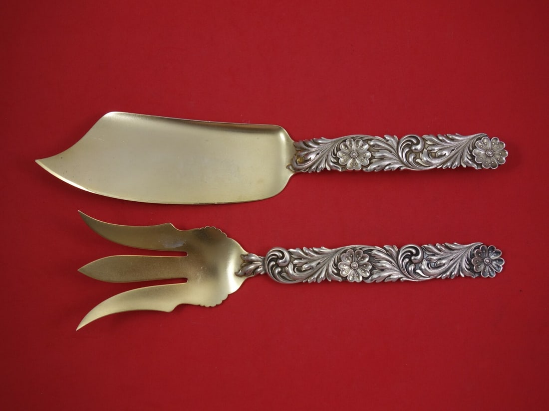Shiebler 2pc Sterling Silver Fish Serving Set Gold Washed Frosted Flowers: Shiebler 2pc Sterling Silver Fish Serving Set Gold Washed Frosted Flowers Enhance your dining experience with this exquisite 2-piece Fish Serving Set by Shiebler. Crafted from high-quality sterling si