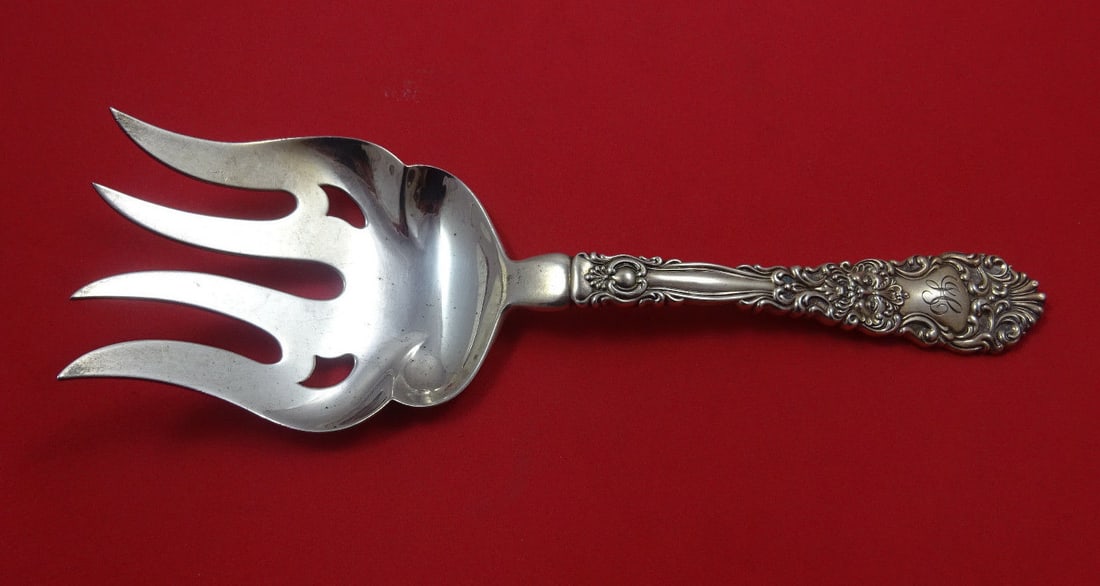 Dominick and Haff Renaissance Sterling Silver Fish Serving Fork 8 3/4": Dominick and Haff Renaissance Sterling Silver Fish Serving Fork 8 3/4" This exquisite fish serving fork, crafted by Dominick and Haff, showcases the elegance of the Renaissance pattern. Made of high-q