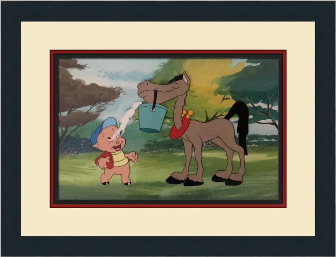 Framed Porky Pig's Prized Pony Hand Painted Cel by Marty Taras: Framed Porky Pig's Prized Pony Hand Painted Cel by Marty Taras Experience the charm of classic animation with this hand-painted production cel featuring Porky Pig from the beloved Looney Tunes franchi
