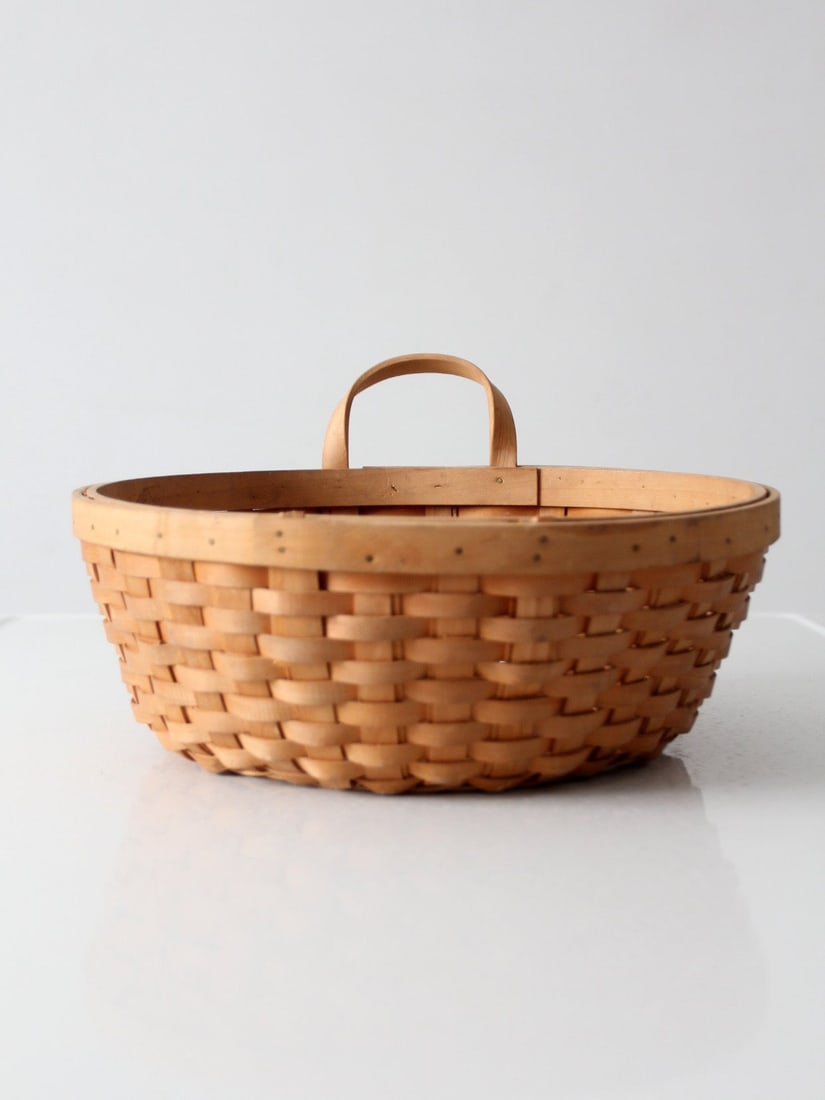 Round Woven Wood Basket with Handle 13 inch Vintage: Round Woven Wood Basket with Handle 13 inch Vintage Vintage handwoven wood splint basket with a generous round shape and natural woven construction. It is suitable for use as a catchall for fruit, nap