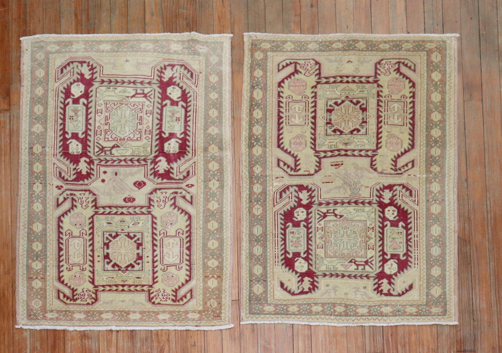Pair of Turkish Anatolian Kazak Yastik Rugs 2' 4" x 3' 3": Pair of Turkish Anatolian Kazak Yastik Rugs 2' 4" x 3' 3" Matching pair of vintage Kazak rugs with mid-20th century Turkish origin and Caucasian Kazak pattern influence. These pre-owned rugs are offer
