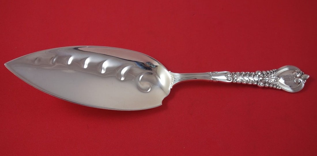 Tiffany & Co. Florentine Sterling Silver Fish Server 11.25": Tiffany & Co. Florentine Sterling Silver Fish Server 11.25" This exquisite fish server from the renowned Florentine collection by Tiffany & Co. is crafted from high-quality sterling silver and measure