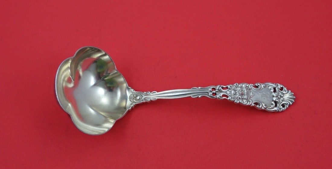 Dominick & Haff Renaissance Sterling Gravy Ladle Gold Washed 7 1/4": Dominick & Haff Renaissance Sterling Gravy Ladle Gold Washed 7 1/4" This exquisite gravy ladle, crafted from sterling silver, belongs to the Renaissance pattern by Dominick & Haff. With a length of 7 