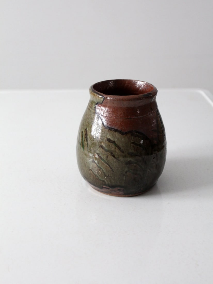Signed Vintage Studio Pottery Vase Hand-Painted Green Brown Glaze: Signed Vintage Studio Pottery Vase Hand-Painted Green Brown Glaze This vintage studio pottery vase showcases a unique handcrafted design, featuring a beautiful hand-painted green and brown glaze. The 