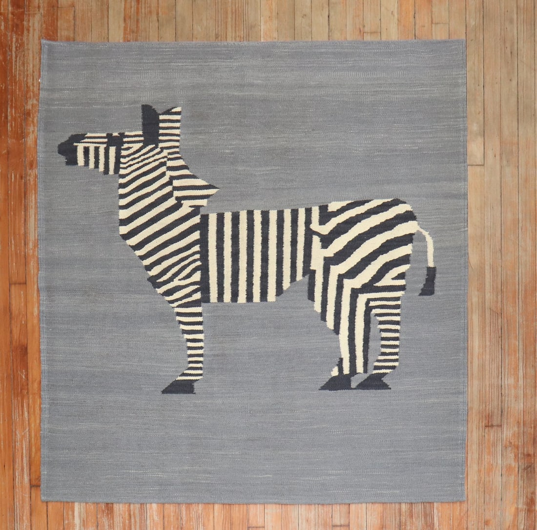 4' 10" x 4' 10" Square Persian Kilim Zebra Wall Hanging: 4' 10" x 4' 10" Square Persian Kilim Zebra Wall Hanging Late 20th century Persian pictorial kilim wall hanging featuring a small zebra on a gray ground. This square flatweave has a quirky pictorial de