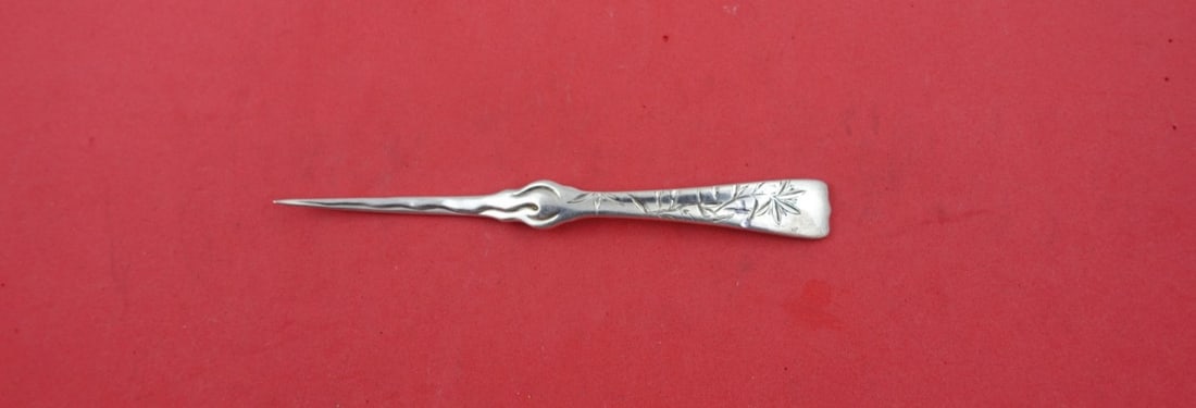 Tiffany & Co Sterling Silver Nut Pick Floral Motif 5 Inch: Tiffany & Co Sterling Silver Nut Pick Floral Motif 5 Inch This exquisite sterling silver nut pick, measuring 5 inches, features a beautiful floral motif and showcases the elegant Lap Over Edge Acid Et