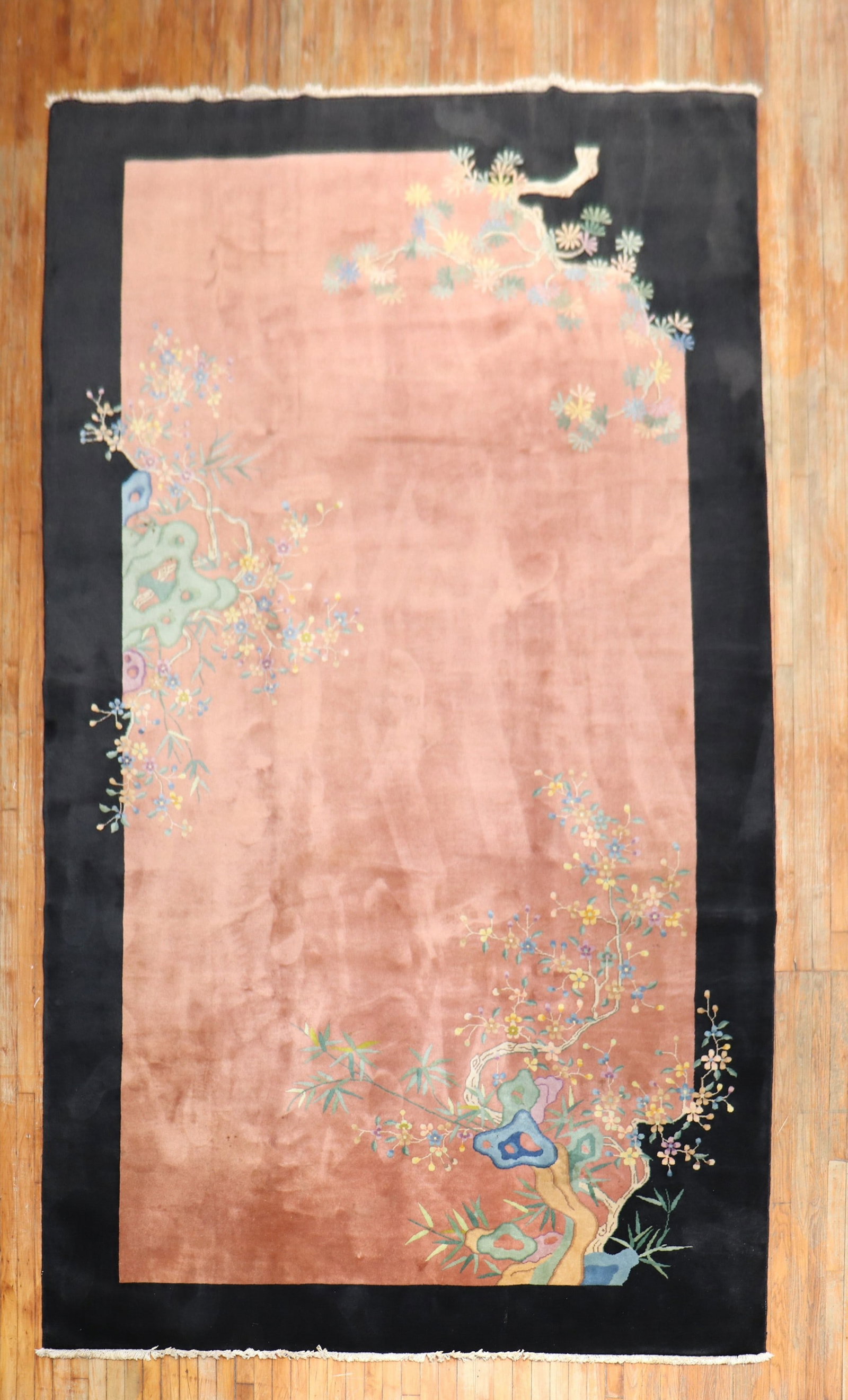 7' 6" x 14' 5" Floral Chinese Deco Rug: 7' 6" x 14' 5" Floral Chinese Deco Rug A floral Art Deco Chinese rug dating to the 1940s. This pre-owned piece is presented in an unusual size and reflects the distinctive decorative style of Chinese 