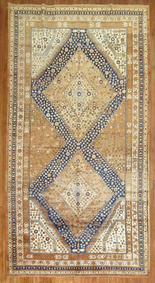 7' 2" x 14' Gallery Khotan Rug with Apricot Ground: 7' 2" x 14' Gallery Khotan Rug with Apricot Ground Vintage 20th century Khotan gallery rug featuring a geometric design with an apricot ground and two large-scale navy medallions. Pre-owned condition.