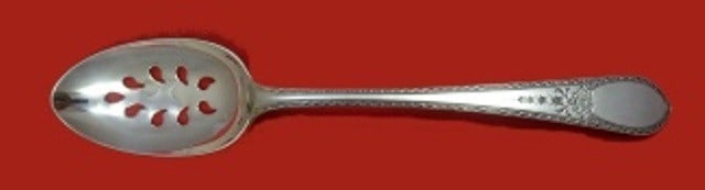 Lunt Early American Engraved Sterling Silver Pierced Serving Spoon 8 5/8": Lunt Early American Engraved Sterling Silver Pierced Serving Spoon 8 5/8" Sterling silver slotted serving spoon by Lunt in the Early American Engraved pattern. This custom-made piece features a pierce