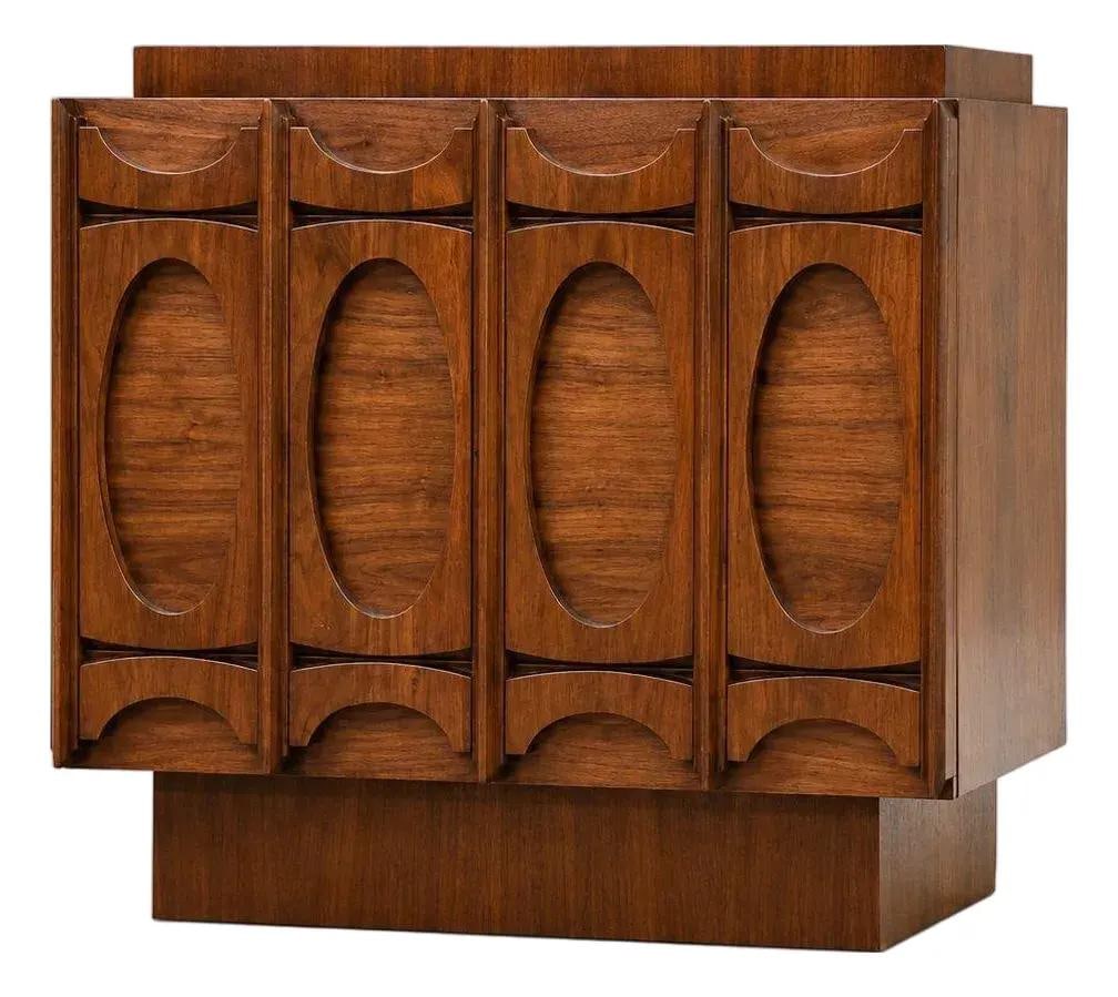 Walnut Brutalist Style 2 Door Nightstand 26" Wide Canada 1970s: Walnut Brutalist Style 2 Door Nightstand 26" Wide Canada 1970s Mid-century modern brutalist style walnut nightstand with two doors, made in Canada and dating to the 1970s. This pre-owned piece is desc