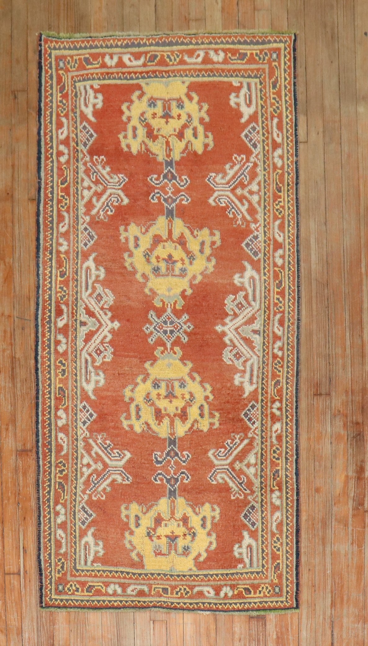 3' 1" x 6' 4" Turkish Oushak Rug Runner in Red: 3' 1" x 6' 4" Turkish Oushak Rug Runner in Red Small antique Turkish Oushak runner from the 1930s in a red colorway. This pre-owned rug is categorized as a runner and retains the classic character ass