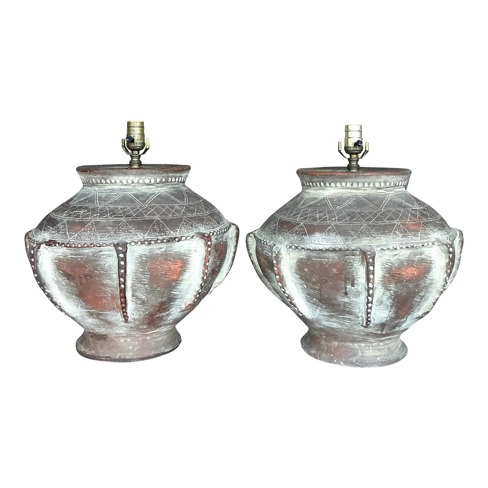 Pair of Vintage Boho Scored Terracotta Lamps Chestnut Finish: Pair of Vintage Boho Scored Terracotta Lamps Chestnut Finish Introduce a touch of earthy elegance to your home with this pair of Vintage Boho Scored Terracotta Lamps. Each lamp showcases a hand-sculpt