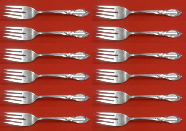 International Sterling Silver Salad Fork Set Rhapsody New 12 pcs 6.5 inches: International Sterling Silver Salad Fork Set Rhapsody New 12 pcs 6.5 inches Enhance your dining experience with this exquisite set of 12 salad forks from the Rhapsody New pattern by International. Cra