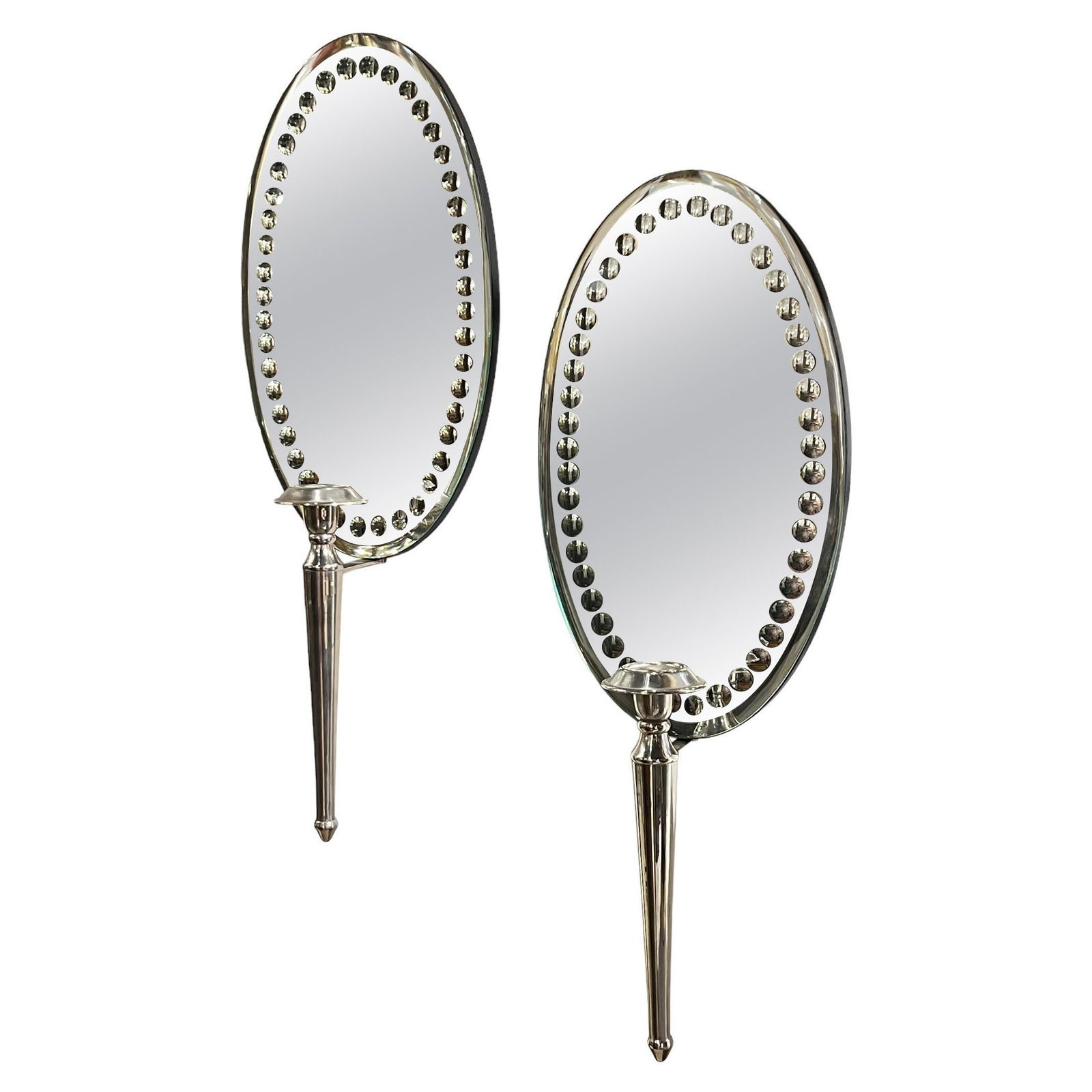 Set of 2 Mid-Century Mirror Back Silver Plate Wall Sconces: Set of 2 Mid-Century Mirror Back Silver Plate Wall Sconces This pair of mid-century modern wall sconces features oval mirror-backed plates adorned with engraved circular dot borders. Crafted from glas