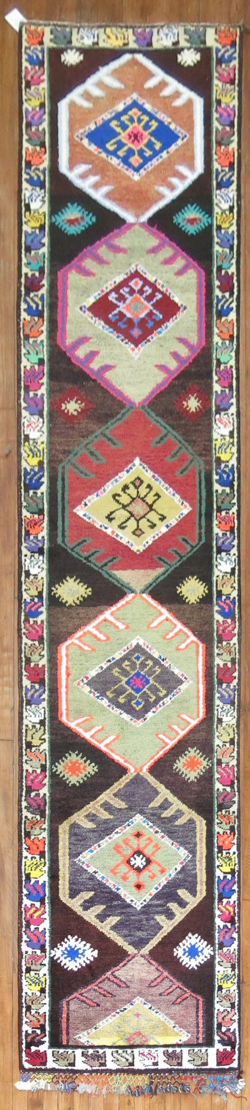 2' 9" x 13' 6" Anatolian Turkish Runner Rug: 2' 9" x 13' 6" Anatolian Turkish Runner Rug One-of-a-kind mid-20th century Turkish runner rug in the Anatolian Attitude type. This pre-owned piece offers a long, narrow runner format suited to hallway