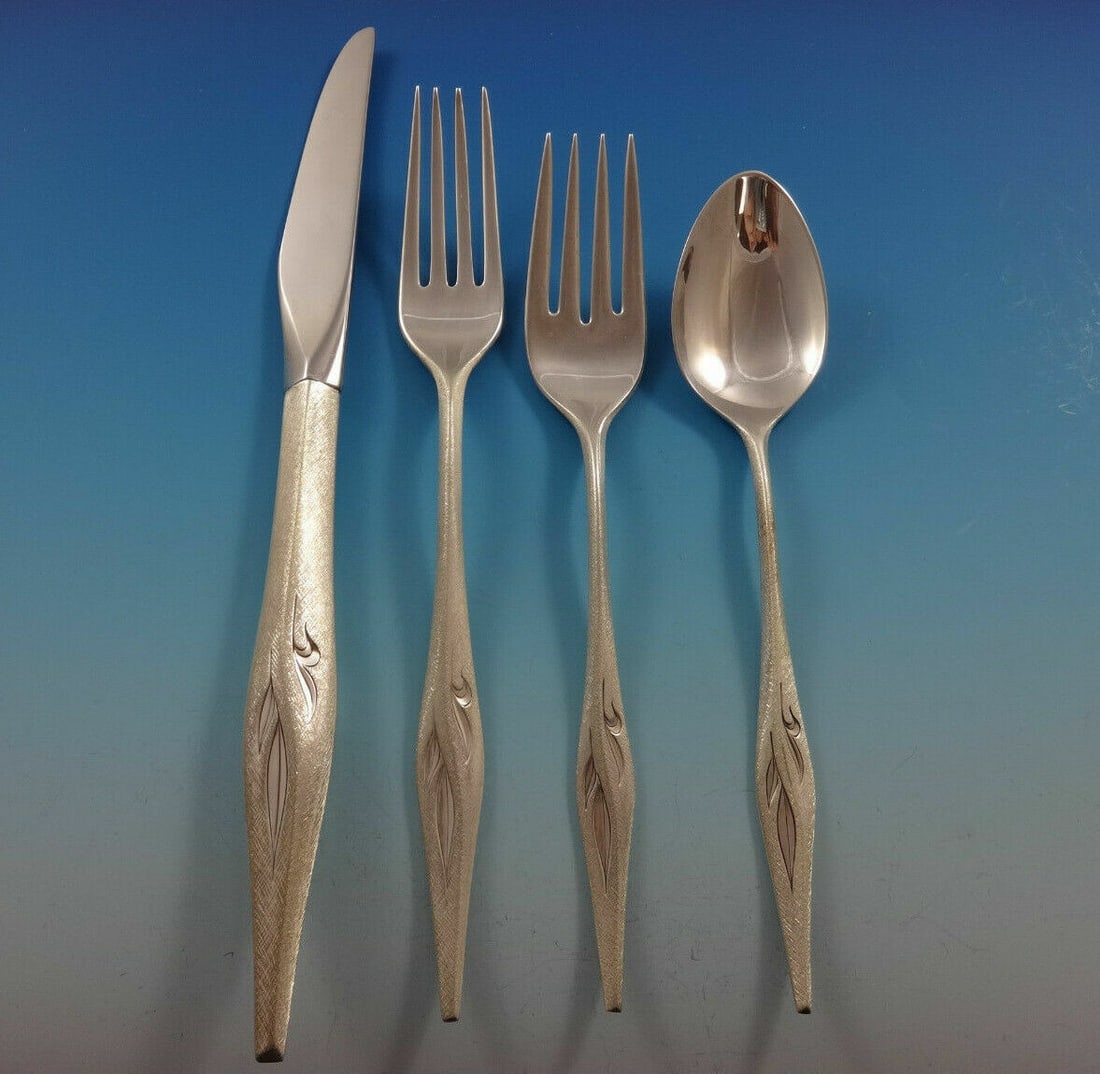 Wallace Dawn Mist Sterling Silver 4-Piece Place Setting: Wallace Dawn Mist Sterling Silver 4-Piece Place Setting This elegant 4-piece place setting in the exquisite Dawn Mist pattern by Wallace is crafted from high-quality sterling silver. The set includes 
