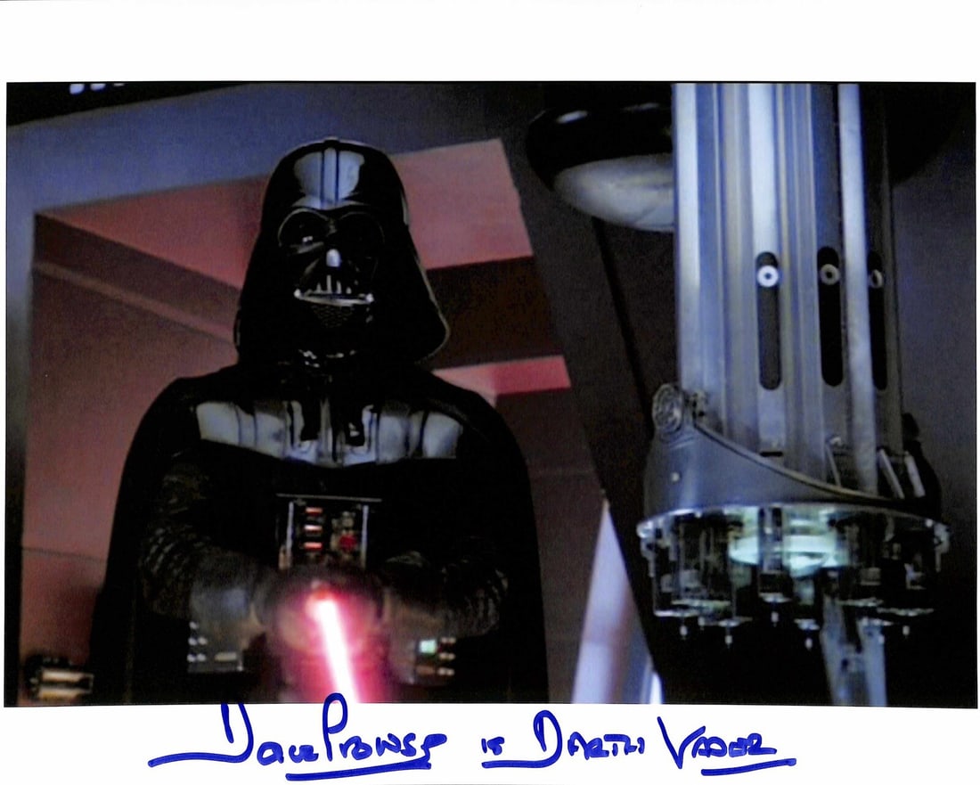 David Prowse Autographed 11x14 Darth Vader Bespin Duel Photo Beckett Certified: David Prowse Autographed 11x14 Darth Vader Bespin Duel Photo Beckett Certified This is an original autographed 11x14 color photograph featuring the iconic Bespin duel between Darth Vader and Luke Skyw