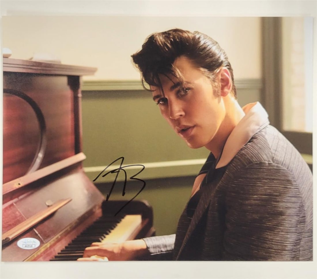 Austin Butler autographed 11x14 Elvis movie photo with JSA hologram: Austin Butler autographed 11x14 Elvis movie photo with JSA hologram This is an original 11x14 photograph from the Elvis Presley movie, signed by Austin Butler. The autograph has been authenticated by 