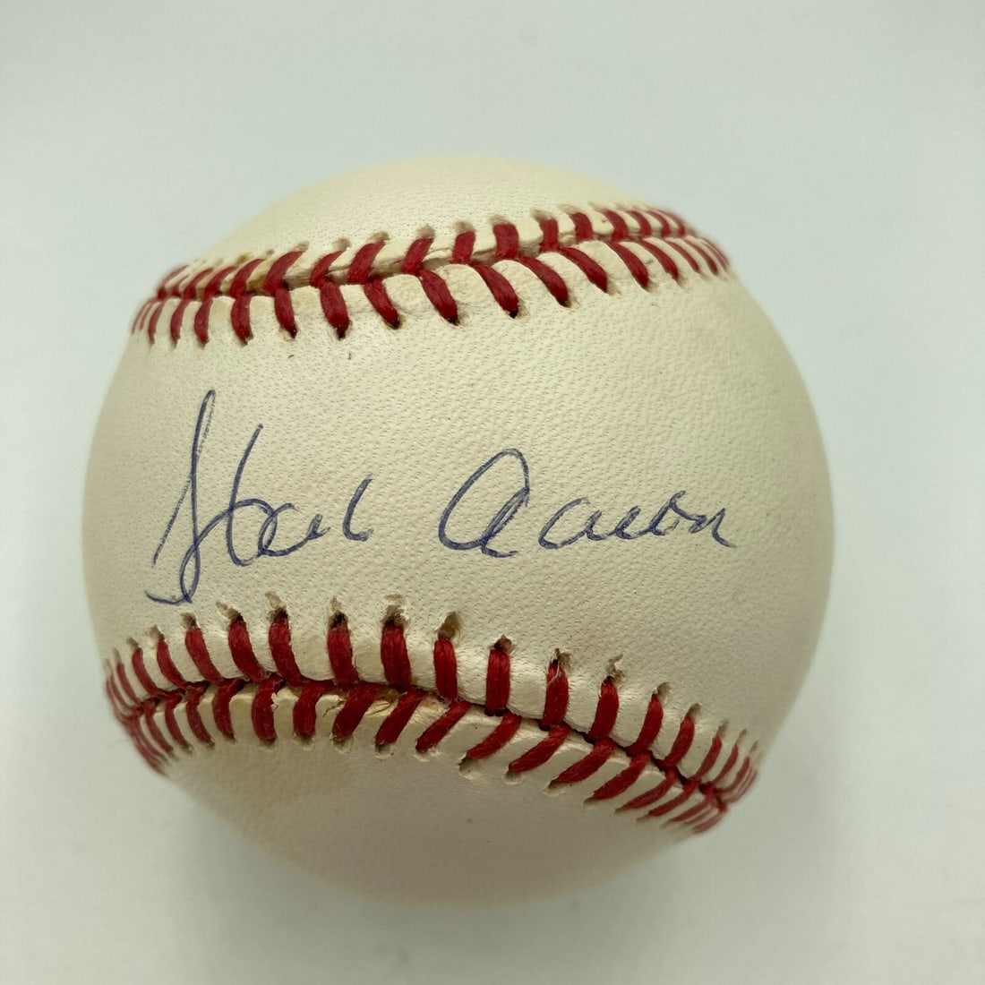 Hank Aaron Signed Official National League Baseball with JSA COA: Hank Aaron Signed Official National League Baseball with JSA COA This is an Official National League baseball signed by Hank Aaron, a legendary figure in MLB history. The baseball comes with a full le